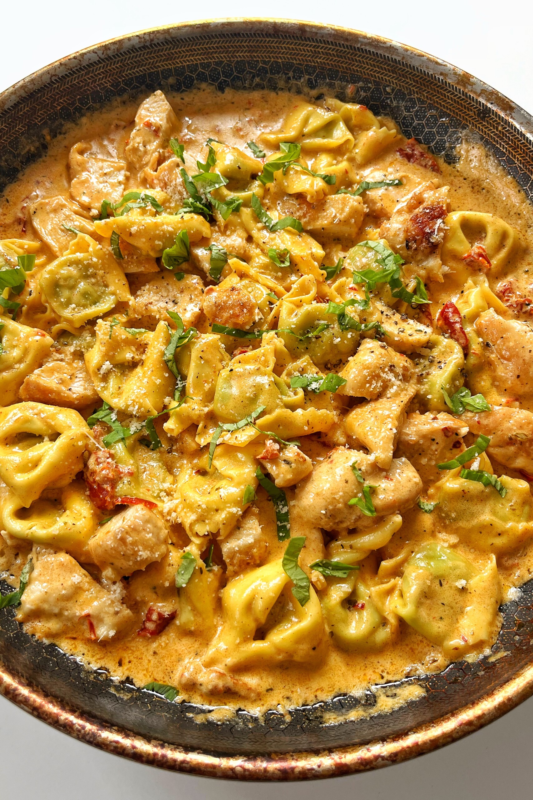 Close up of marry me chicken tortellini in one pan.