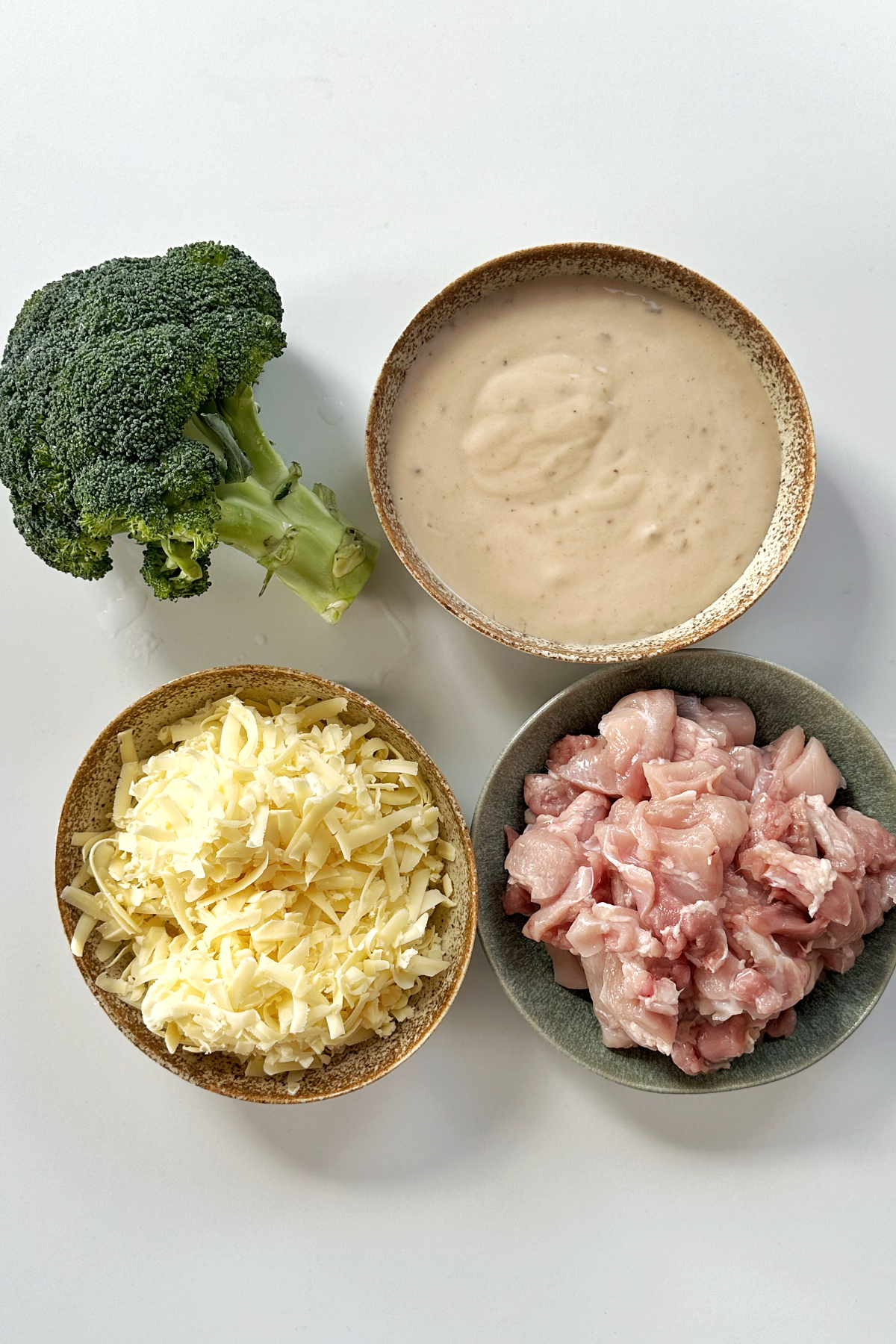 Ingredients on a white background for Nixon's Chicken recipe.