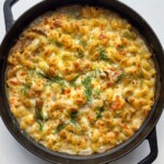 smoked salmon pasta bake in black pan.