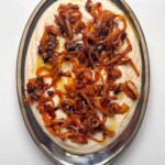 white bean dip on metal tray.