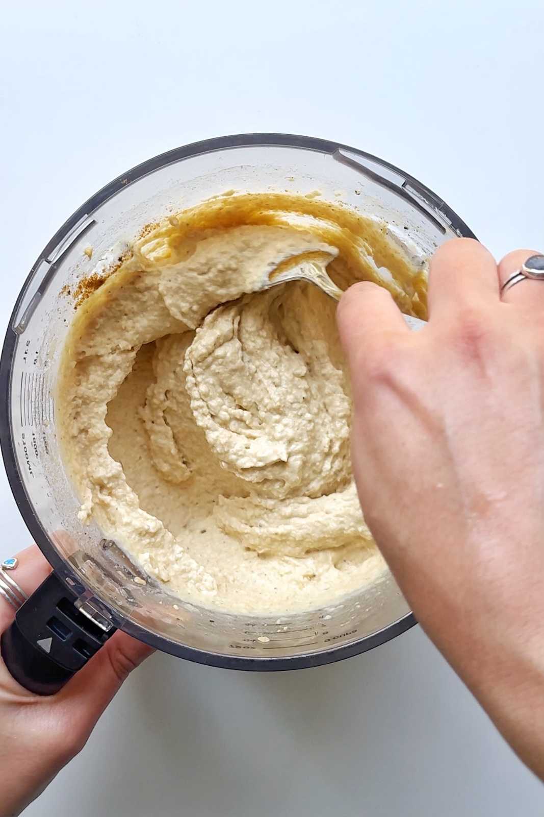 Smooth hummus in a food processor.