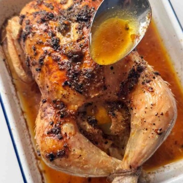 Convection oven roast chicken with soup drizzling chicken juices over the roast chicken.