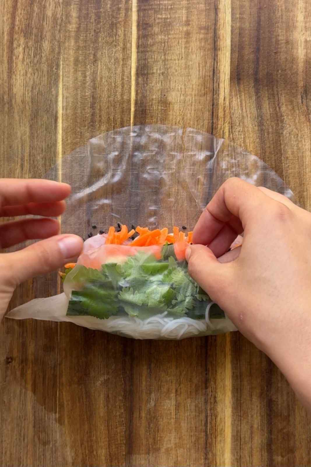 Wrapping summer rolls.