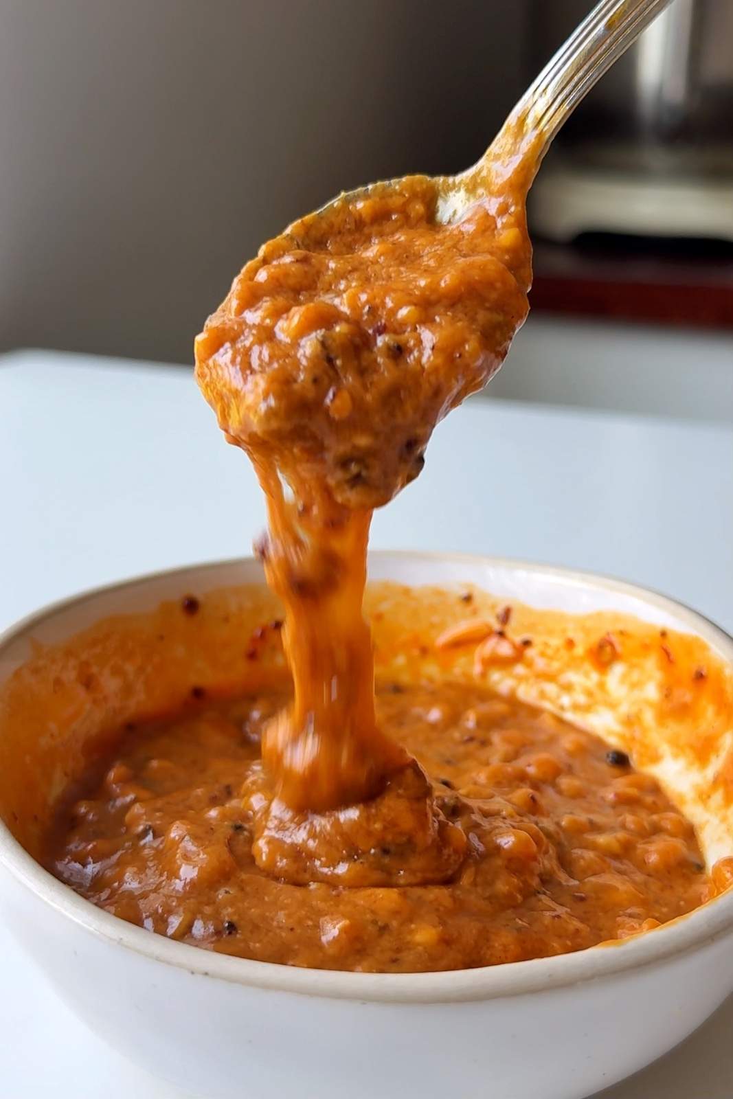 Spoonful of peanut dipping sauce.