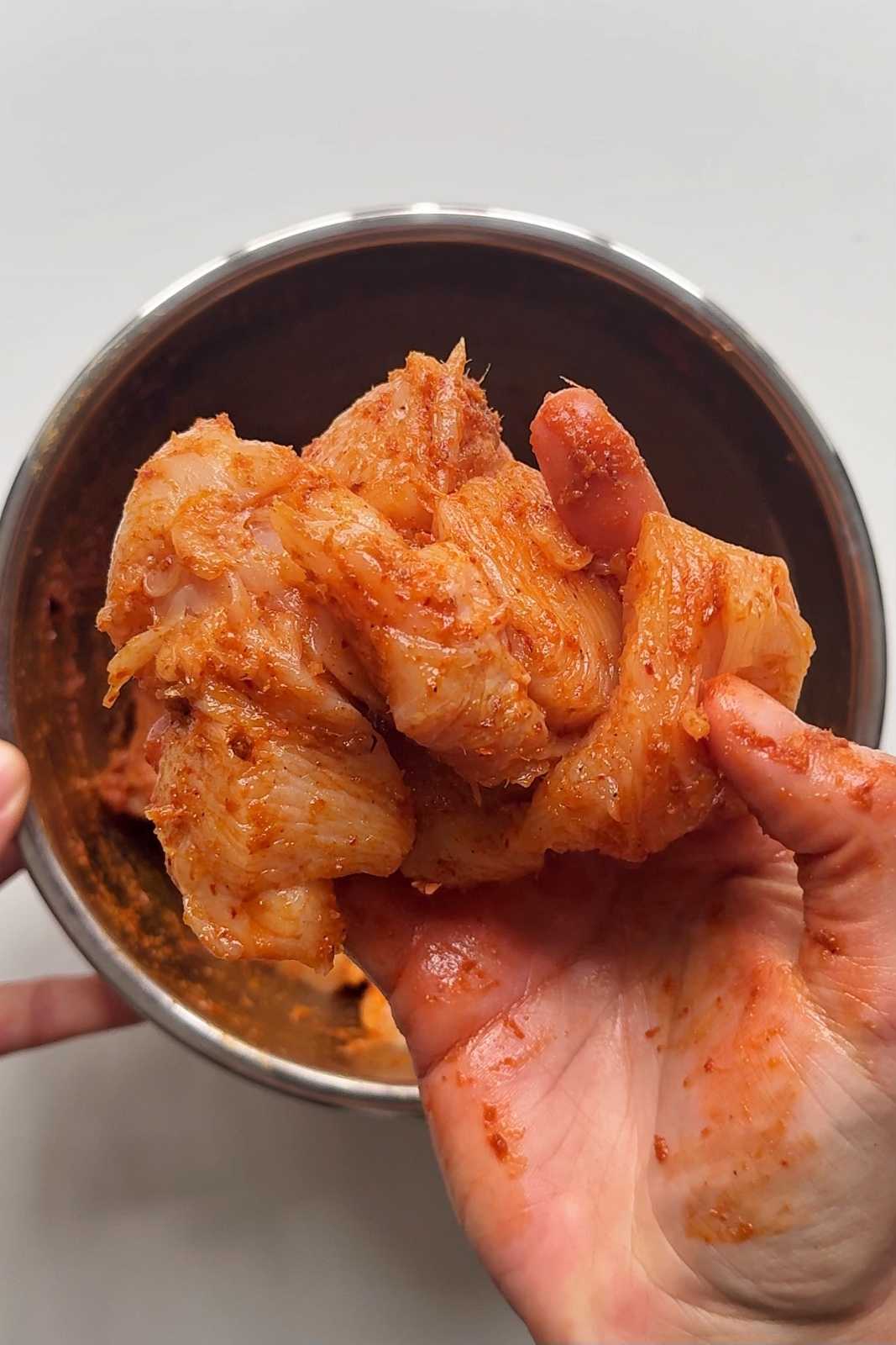 Marinating chicken for thai peanut chicken curry.