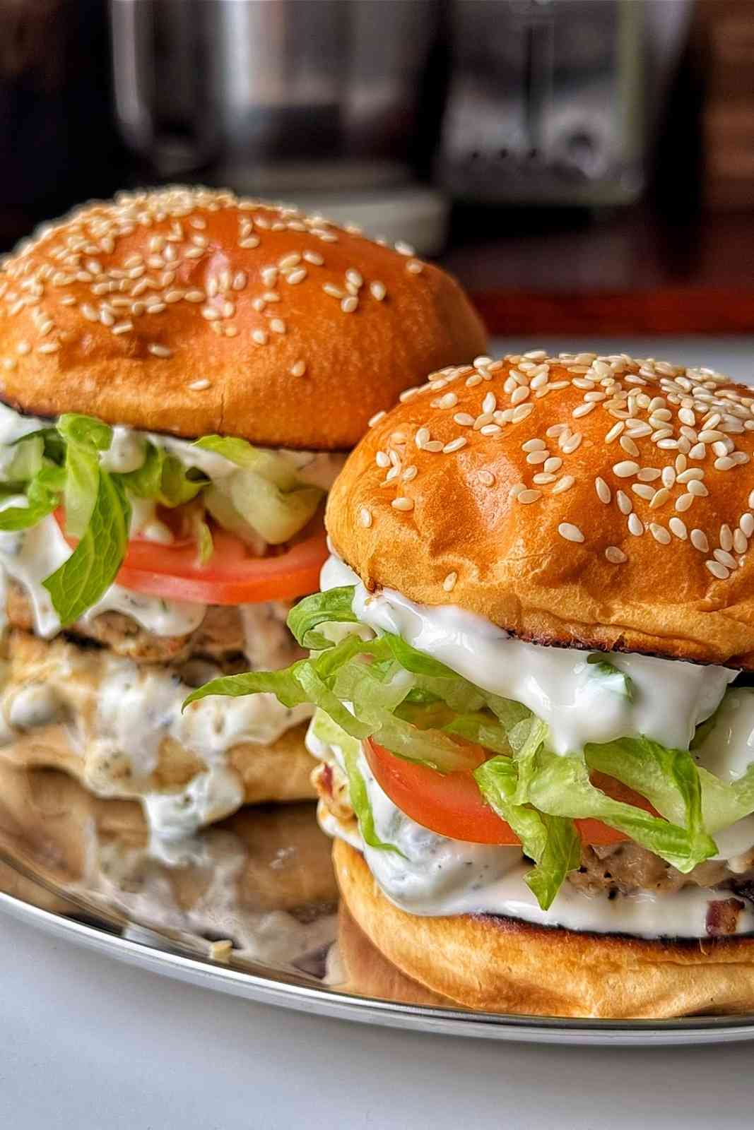 Close up of greek chicken burgers.