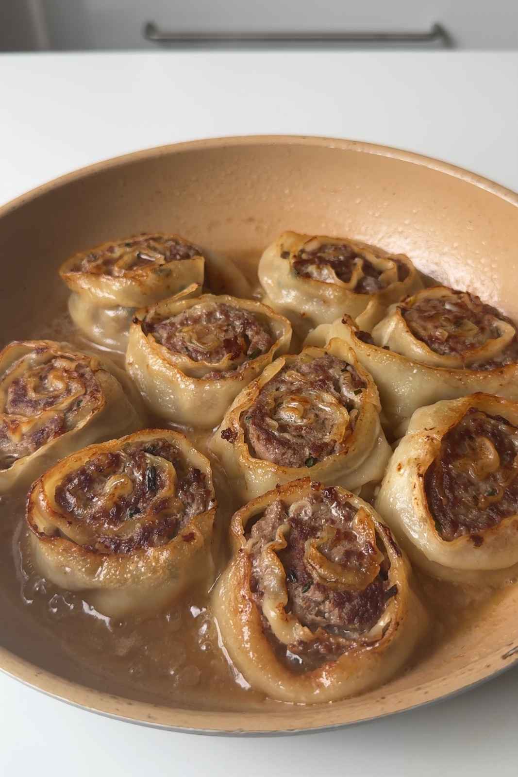 Steaming the dumpling wheels in water.