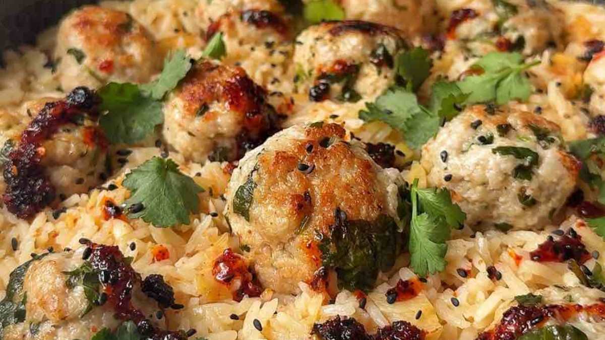 Thai chicken meatballs with rice and cilantro in one pot.