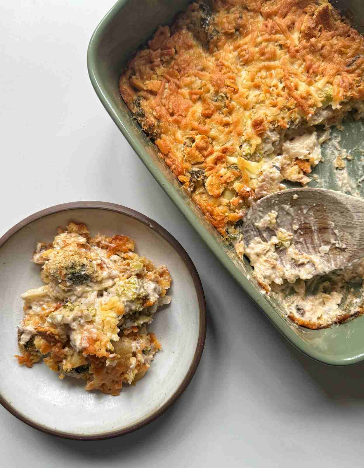 Broccoli casserole with cheddar cheese and a golden Ritz cracker topping.
