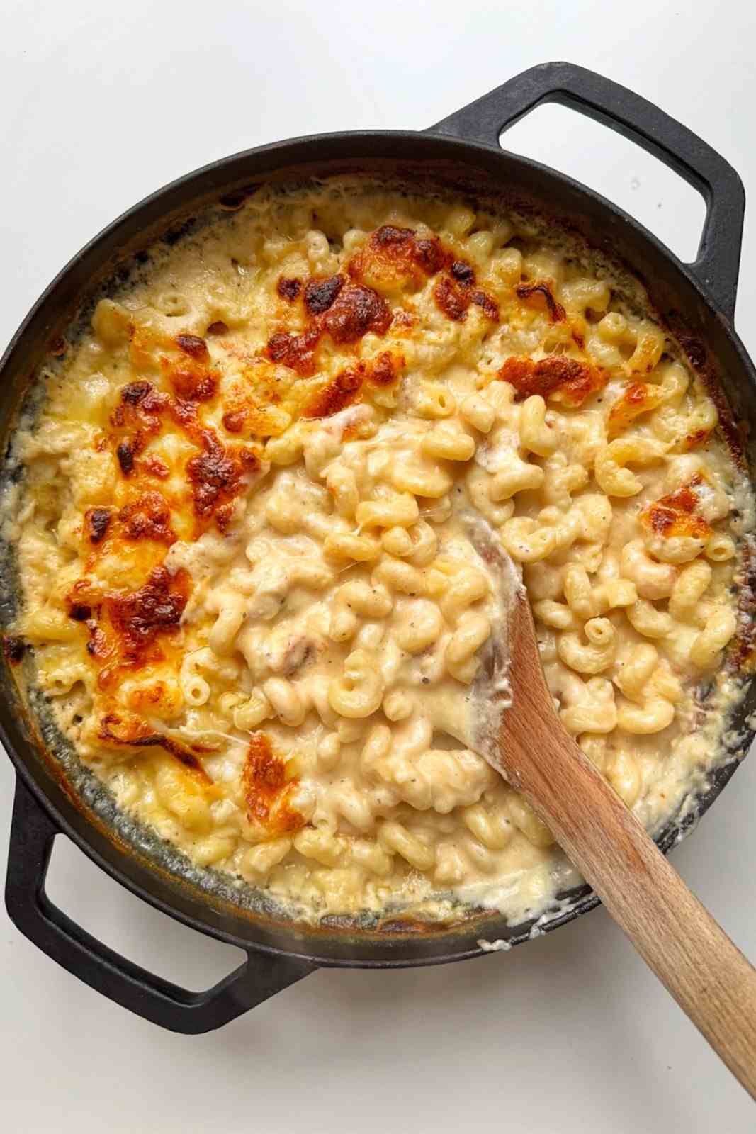 Old fashioned baked macaroni and cheese with a golden cheddar and mozzarella topping.