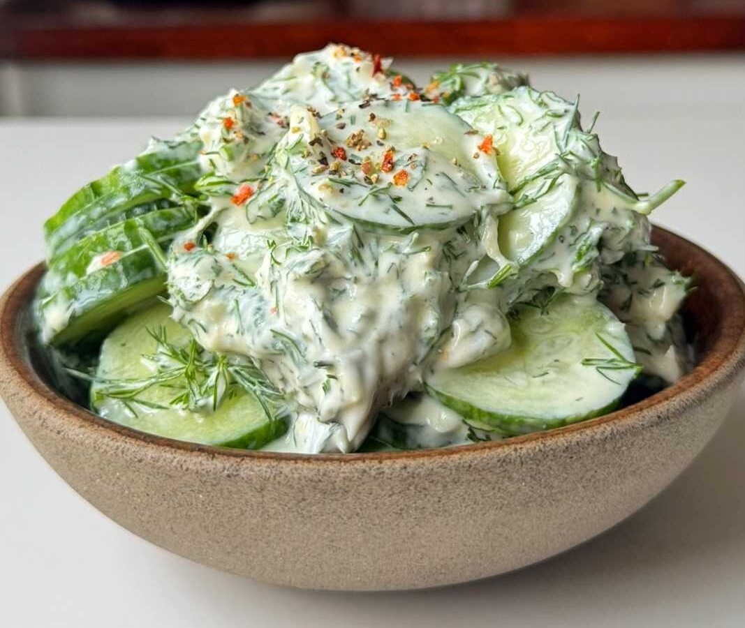 Creamy cucumber dill salad with yogurt, fresh dill and mint.