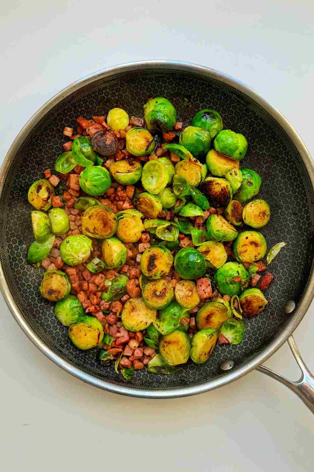 Pan-fried Brussels sprouts and bacon with a balsamic and maple glaze.